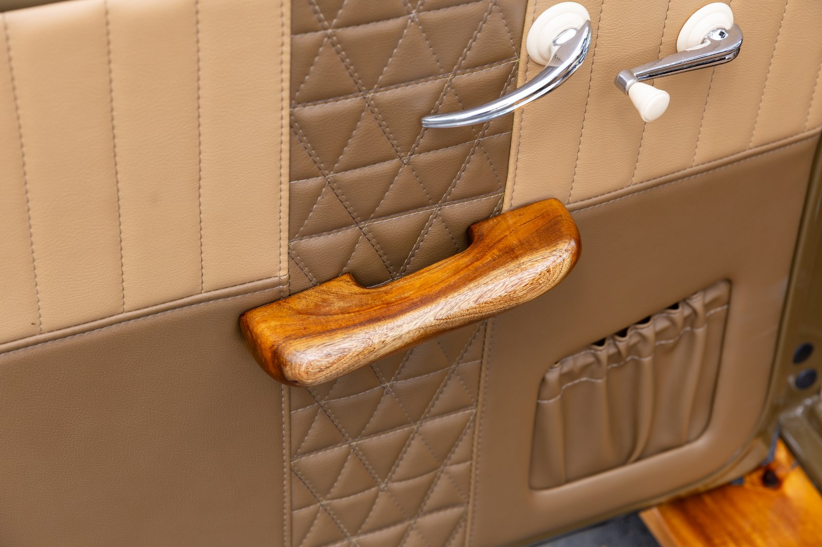 Custom Koa wood armrests were sculpted by Campbell High School teacher David Perreira.